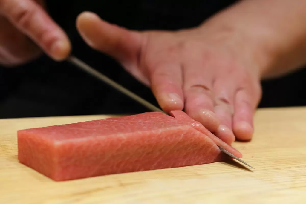 cutting sashimi