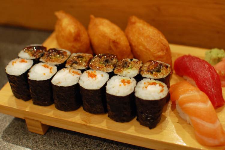 sushi plate with maki nigiri and inarizushi